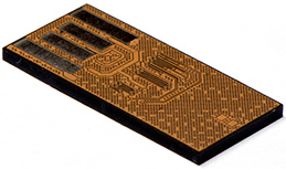 A monolithic flash drive with the solder removed