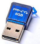 PNY Micro Sleek Attaché with monolithic flash memory. The folded metal lip on the USB connector holds the monolithic chip.