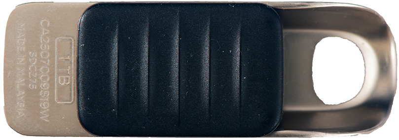 USB flash drive with a ribbed black grip and a metal body; keyring hole on the right