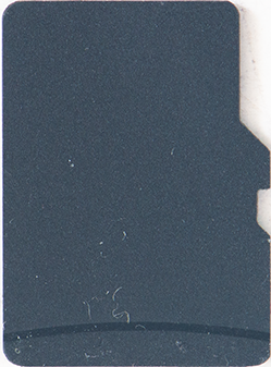 Dark gray rectangular card with rounded corners and a right-edge notch, photographed on a light surface. (Informative)